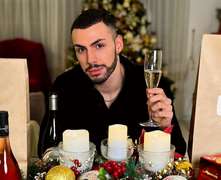 Dimitris Tsede consuming alcohol